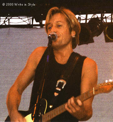 Singing his heart out.